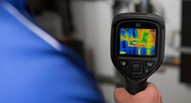 A thermal image camera view of concealed central heating pipes